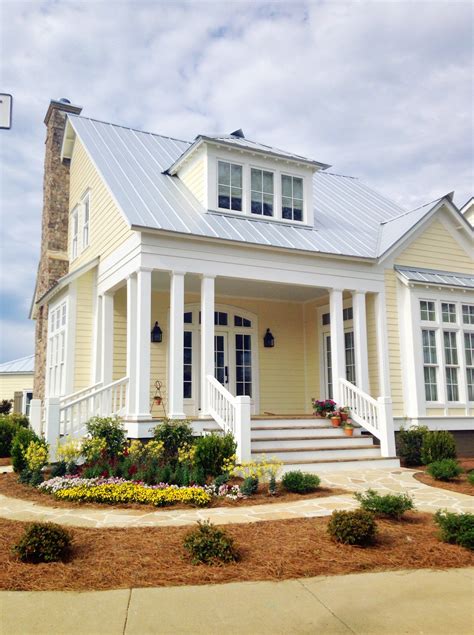 metal roof color yellow house|yellow house with gray roof.